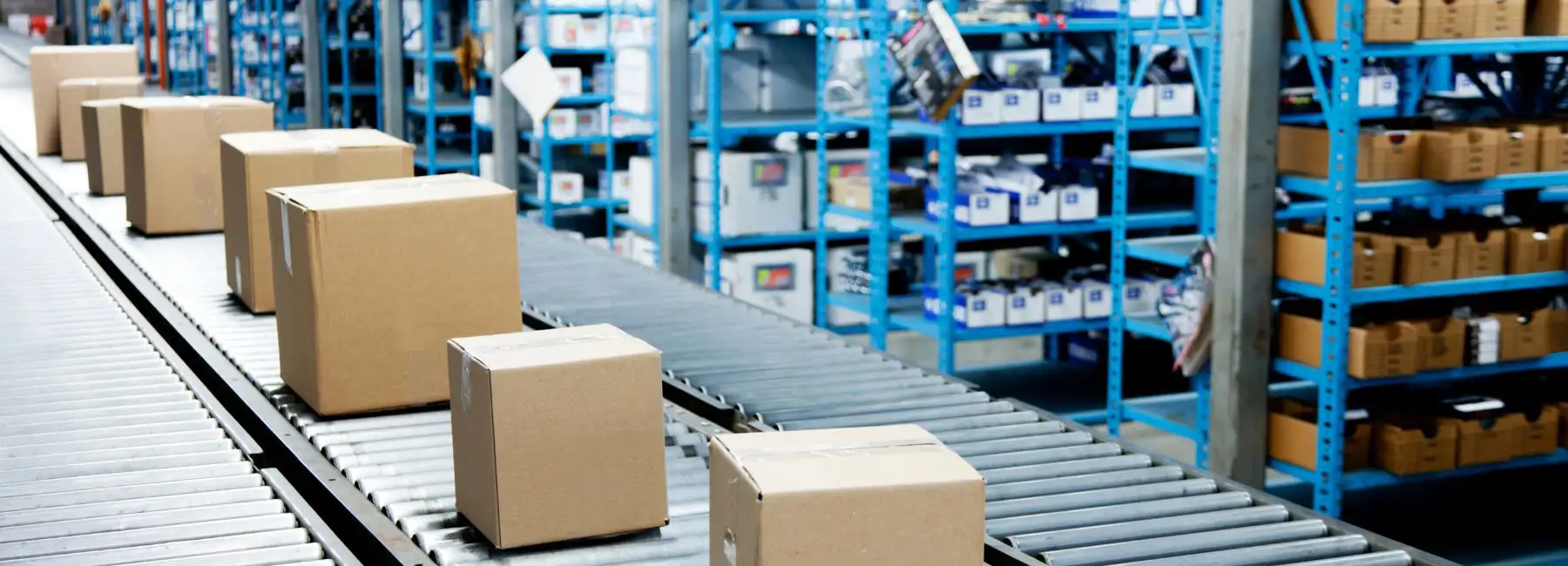 boxes on conveyor belt factory floor