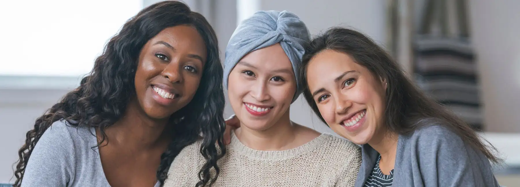 canva image of cancer patient happy with friends