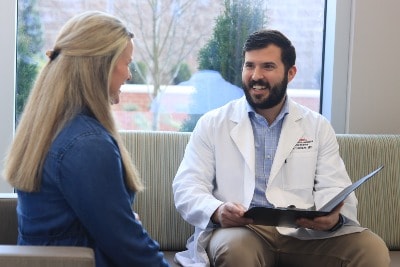 Dr. Dunham with a patient