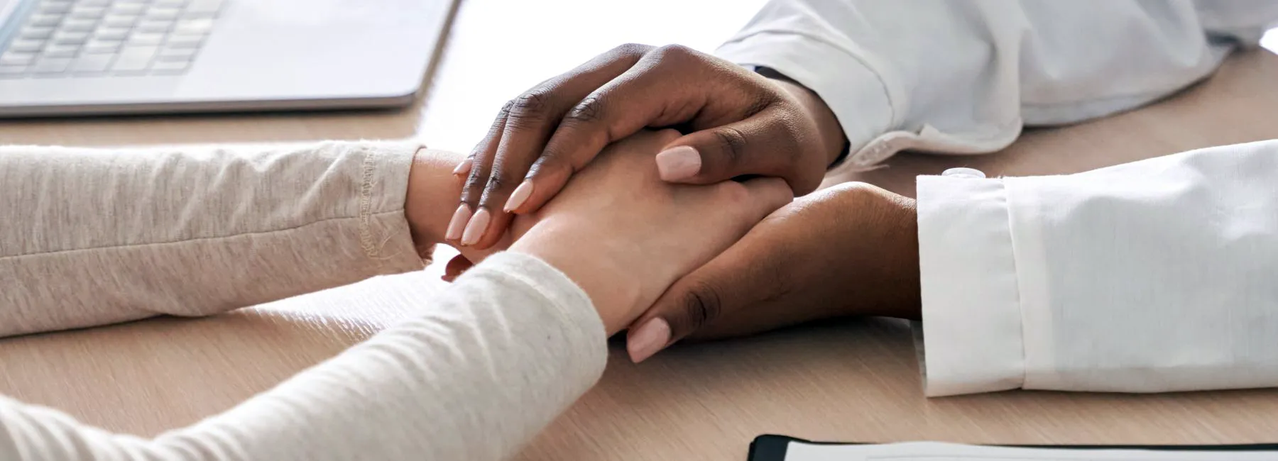 Picture of hands, holding each other