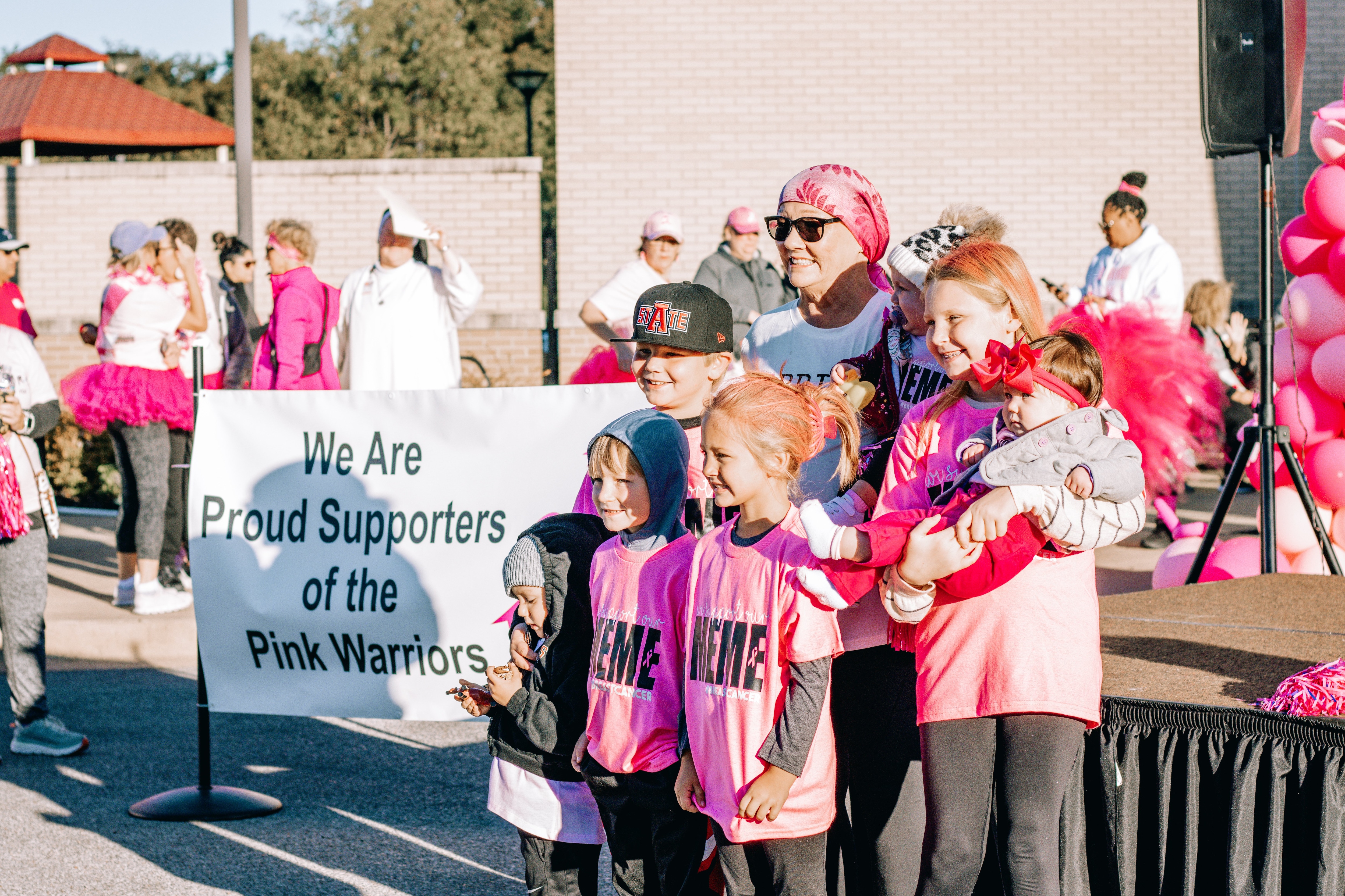 Pink warrior participant with family