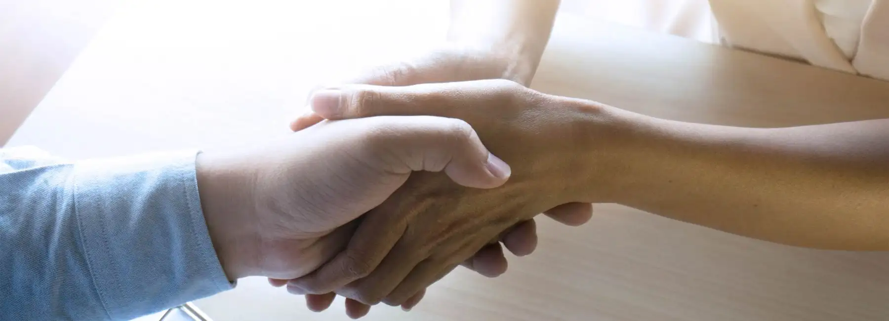 canva image of caring hands